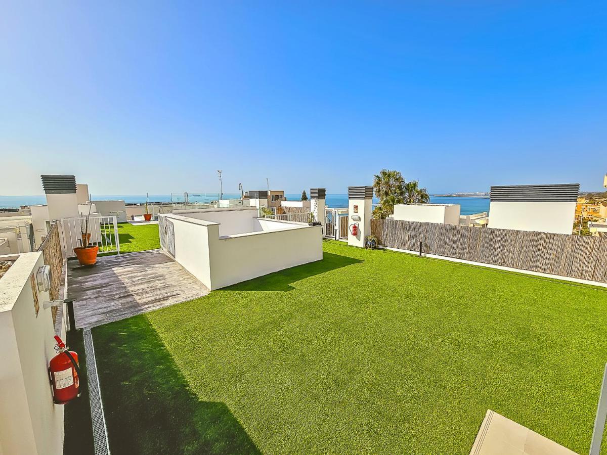 Oceanfront Duplex With A Rooftop Pool And Terrace El Puerto de Santa Maria Exterior photo